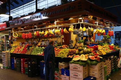 La Boqueria, A large public market in the Ciutat Vella district, known for its diverse food offerings.