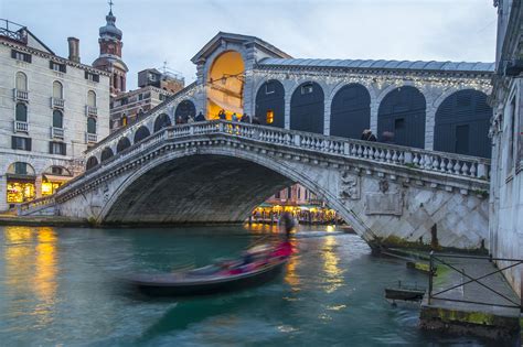 Rialto Bridge, The oldest and most iconic bridge over the Grand Canal.